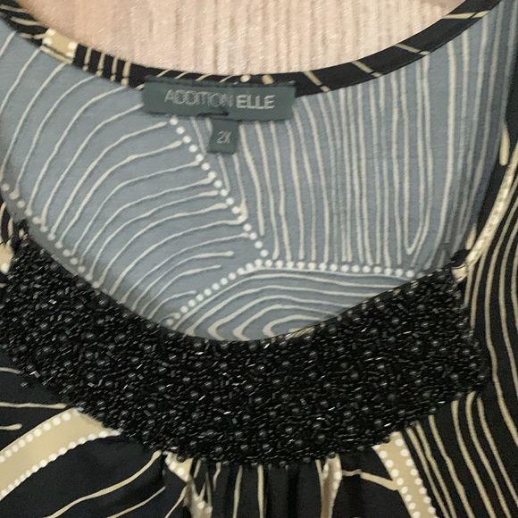 Short sleeve blouse with beeded embellishments on top and handkerchief hem - Picture 2 of 3